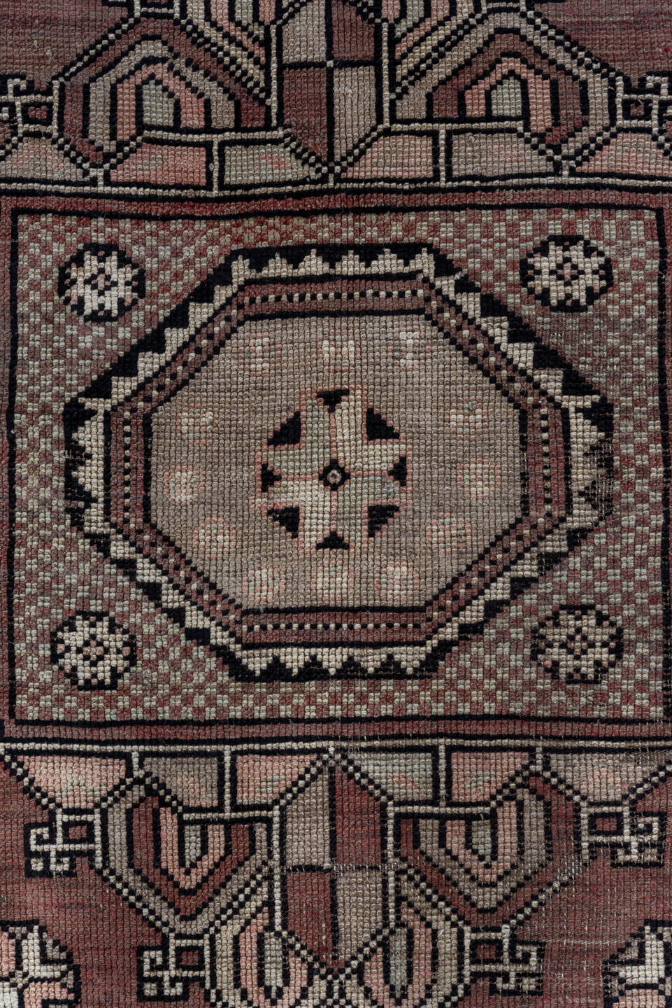 5' x 7' one-of-a-kind handmade vintage Oushak rug. Color palette: black, brown, gray, light gray, pink