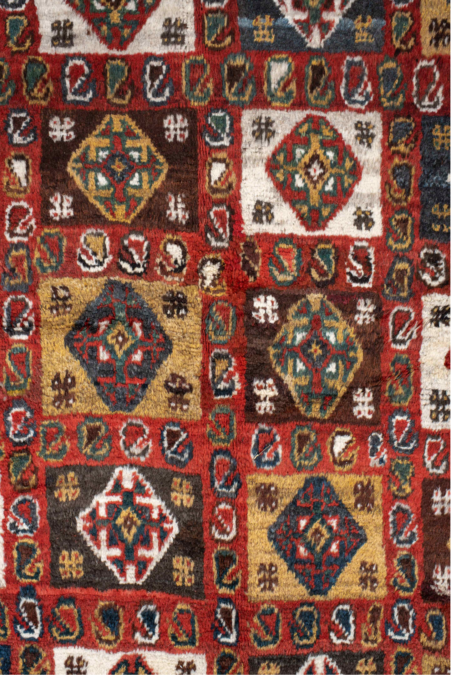 5' x 7' one-of-a-kind handmade vintage Gabbe rug. Color palette: blue, brown, gray, light gray, off-white, orange, peru