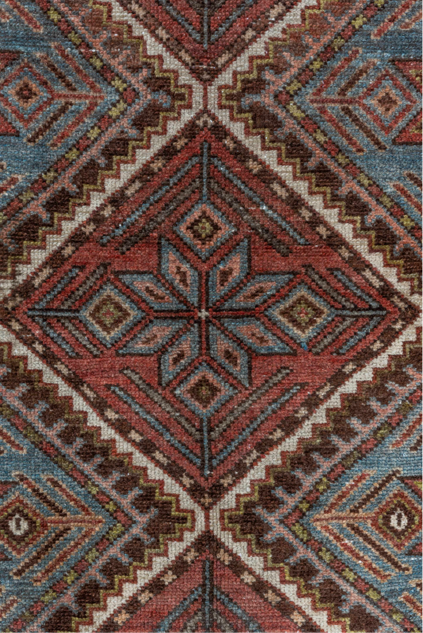 5' x 10' one-of-a-kind handmade vintage Baktiary medium size rug. Color palette: brown, dim gray, gray, light gray, pink