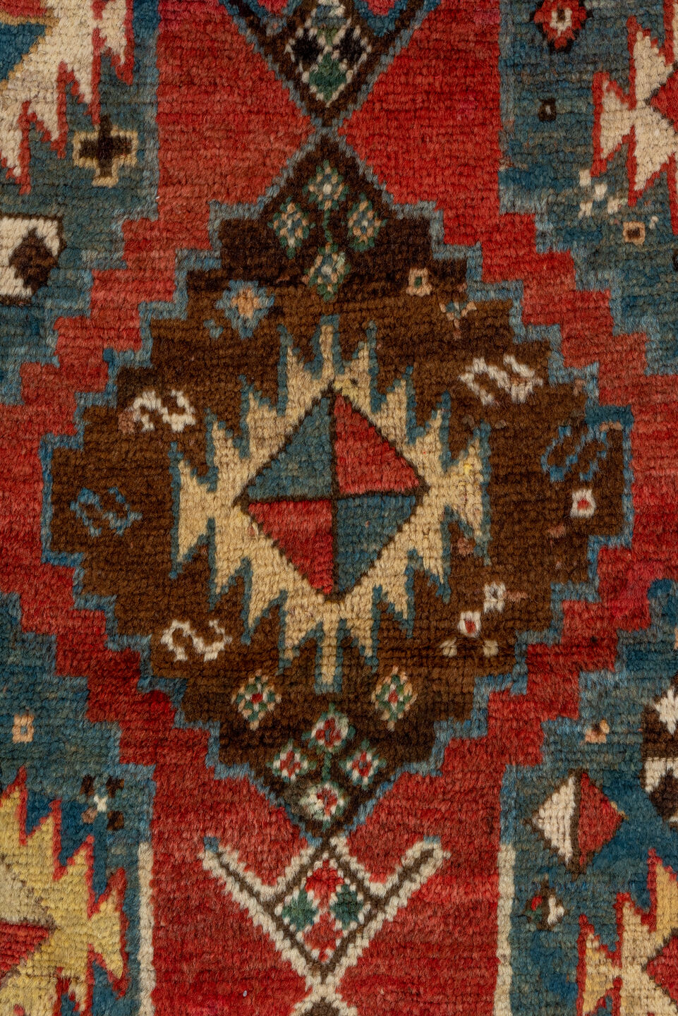 3' x 7' one-of-a-kind handmade vintage Kazak rug. Color palette: arapawa, blue, brown, gray, pink, red, redwood