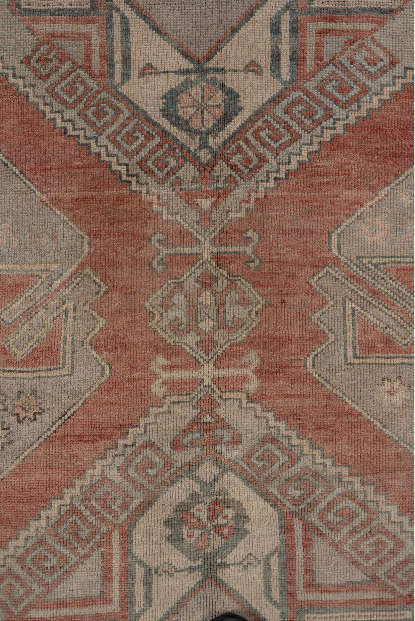 4' x 11' one-of-a-kind handmade vintage Oushak runner rug. Color palette: black, brown, gray, off-white, pink, red, snow