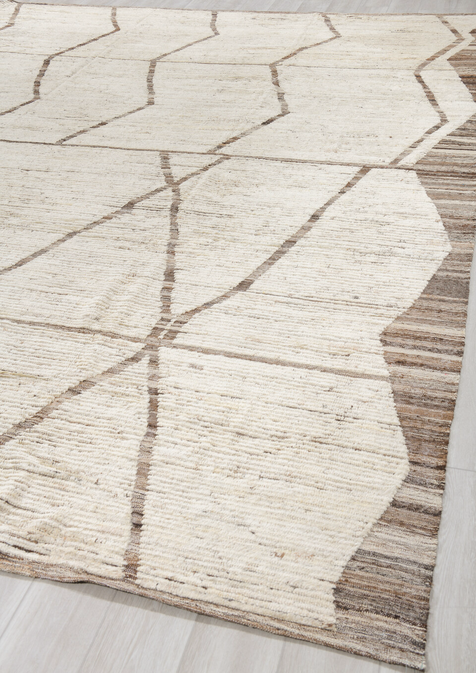 11' x 13' one-of-a-kind handmade vintage Tulu oversize rug. Color palette: dark gray, gray, light gray, linen, off-white