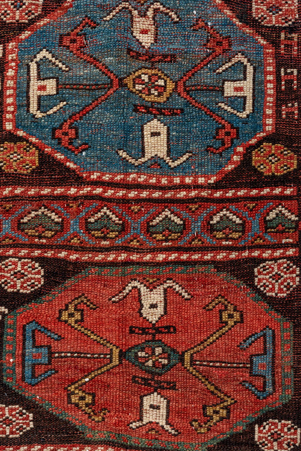 3' x 12' one-of-a-kind handmade vintage Kurd runner rug. Color palette: black, blue, brown, gray, off-white, orange, red