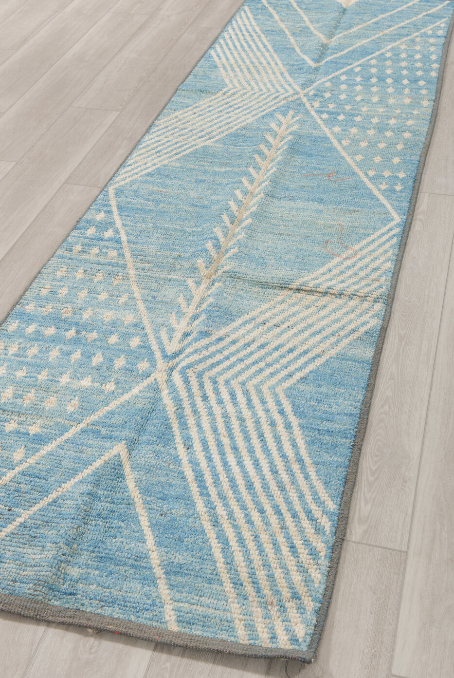 2' x 9' one-of-a-kind handmade vintage Tulu runner rug. Color palette: blue, gray, light blue, light gray, off-white