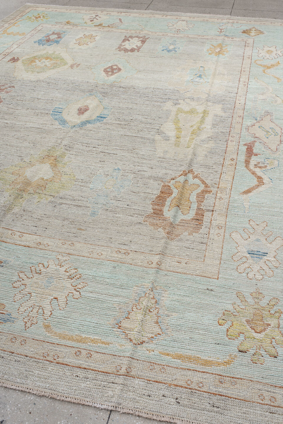 9' x 13' one-of-a-kind handmade vintage Oushak large size rug. Color palette: brown, off-white, gray, pink, blue, light gray