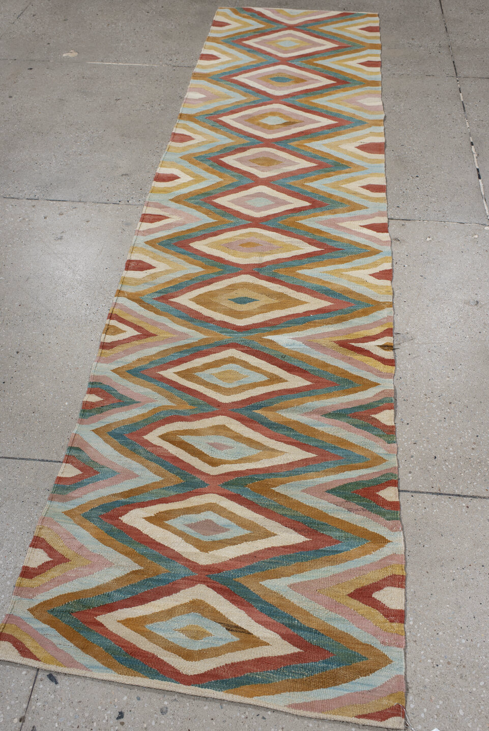 2' x 9' one-of-a-kind handmade vintage Kilim runner rug. Color palette: gray, brown, off-white, light gray, blue, pink