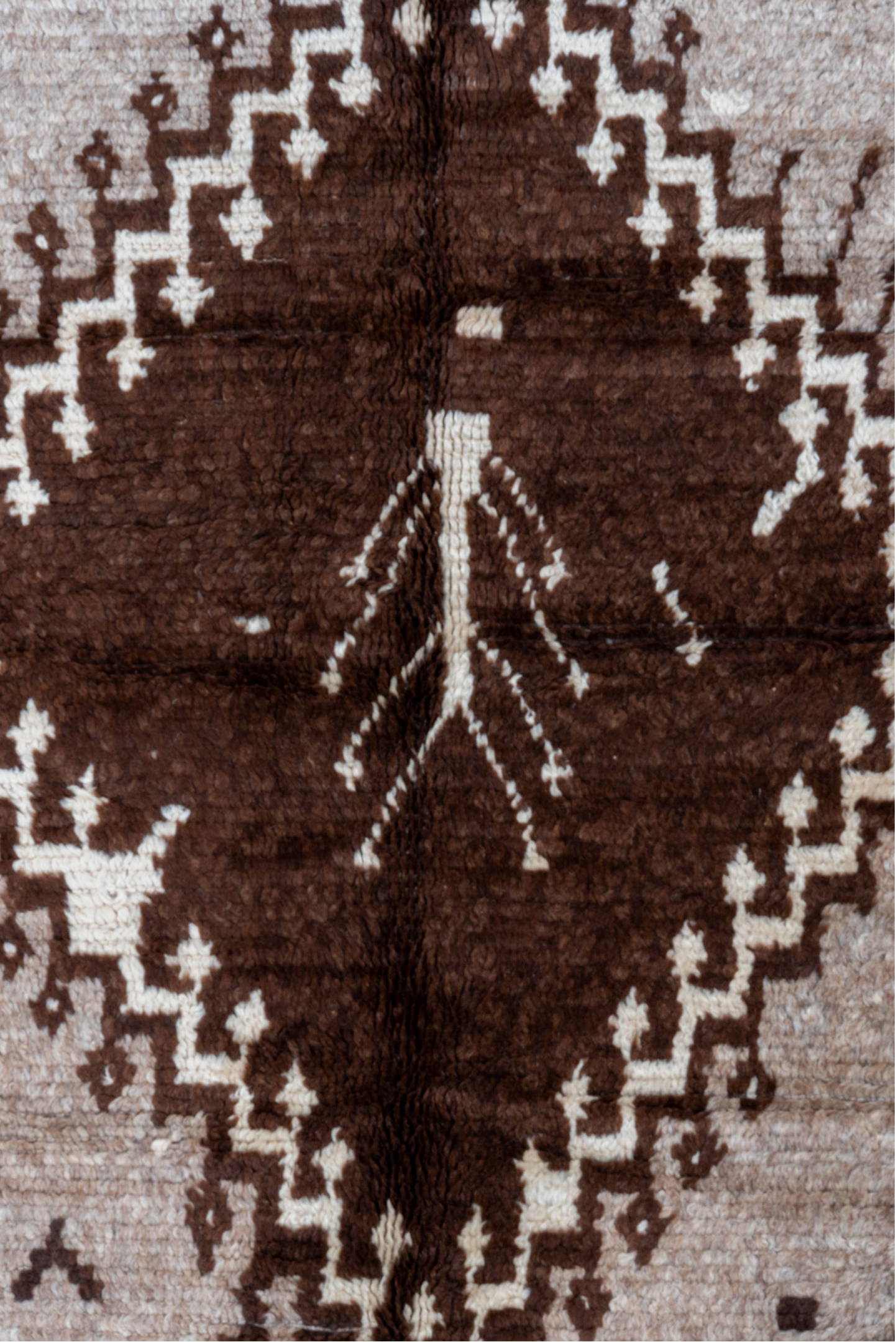 4' x 9' one-of-a-kind handmade vintage Moroccan runner rug. Color palette: black, brown, gray, light gray, off-white, orange