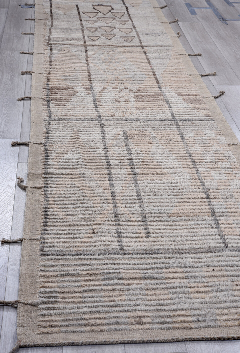 3' x 12' one-of-a-kind handmade vintage Tulu runner rug. Color palette: black, dark gray, gray, light gray, off-white, pink