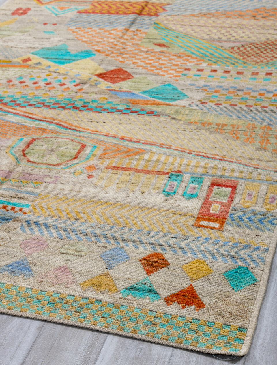 5' x 8' one-of-a-kind handmade vintage Tulu medium size rug. Color palette: black, blue, brown, charcoal, gray, green