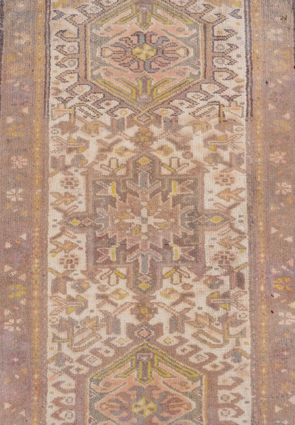 2' x 10' one-of-a-kind handmade vintage Karaje runner rug. Color palette: brown, gray, light gray, off-white, pink, snow