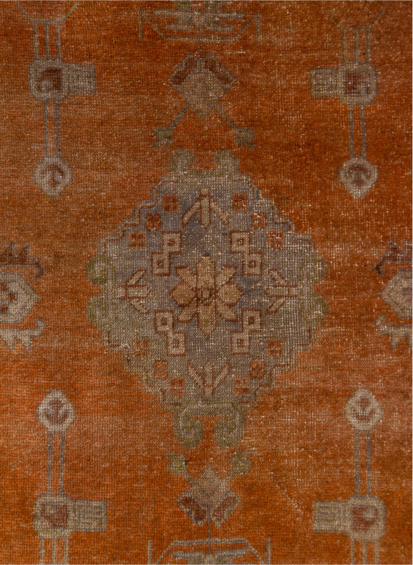 5' x 9' one-of-a-kind handmade vintage Khotan medium size rug. Color palette: brown, light gray, off-white, pink