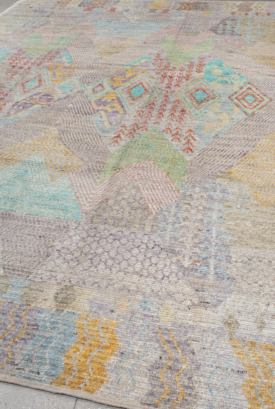 9' x 13' one-of-a-kind handmade vintage Tulu large size rug. Color palette: blue, light gray, off-white, gray, pink, brown