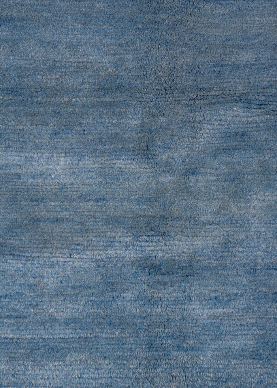 5' x 6' one-of-a-kind handmade vintage Tibetan rug. Color palette: black, blue, dark gray, fiord, gray, light blue