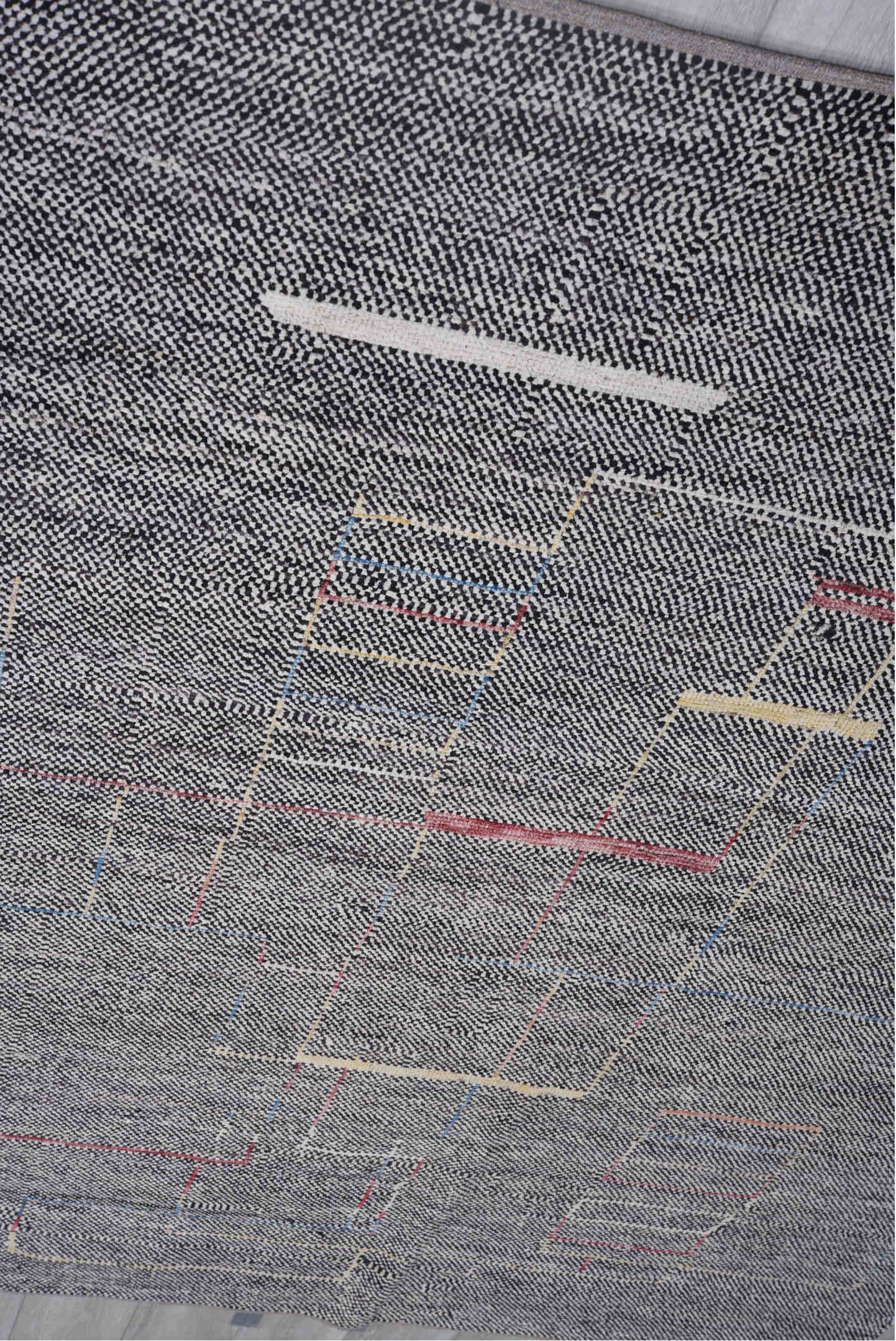 6' x 8' one-of-a-kind handmade vintage Tulu medium size rug. Color palette: black, blue, brown, charcoal, dark gray