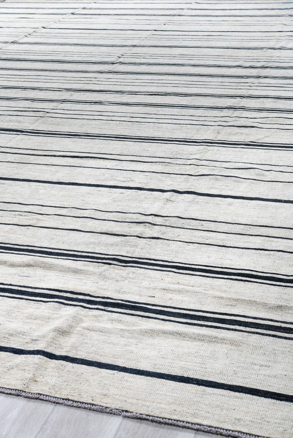 13' x 19' one-of-a-kind handmade vintage Tulu oversize rug. Color palette: black, blue, dark gray, dim gray, gainsboro, gray