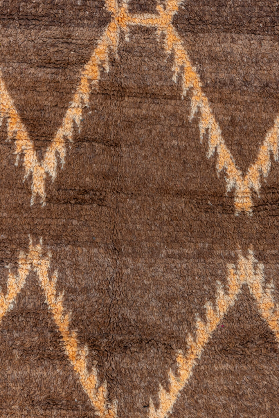 4' x 7' one-of-a-kind handmade vintage Moroccan rug. Color palette: black, blue, brown, gray, off-white, orange, pink