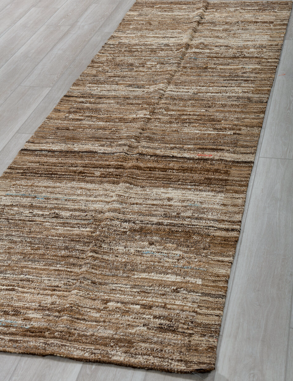 3' x 9' one-of-a-kind handmade vintage Tulu runner rug. Color palette: black, brown, dark gray, gray, light gray, off-white