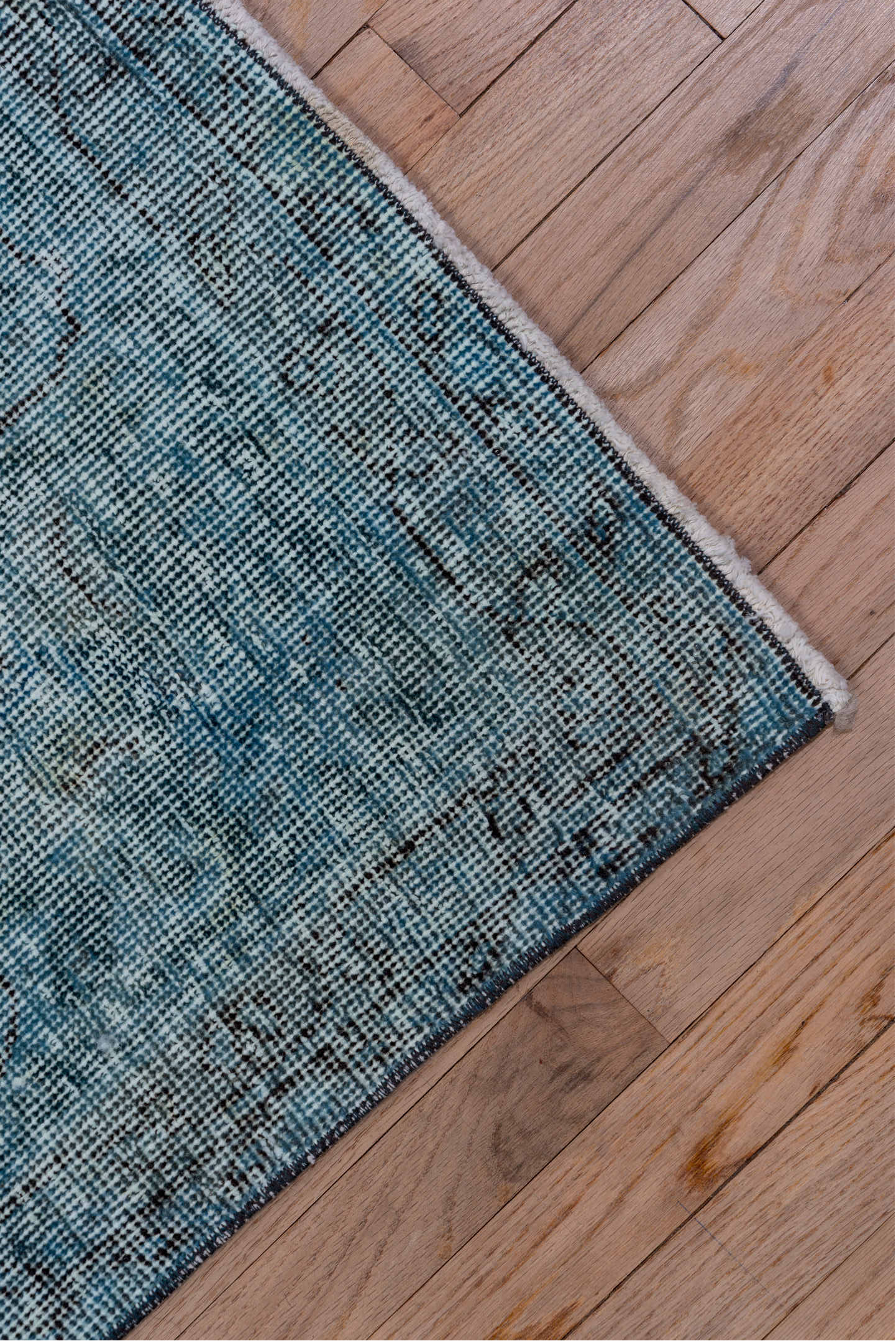 4' x 12' one-of-a-kind handmade vintage Overdyed runner rug. Color palette: arapawa, black, blue, gray, light blue