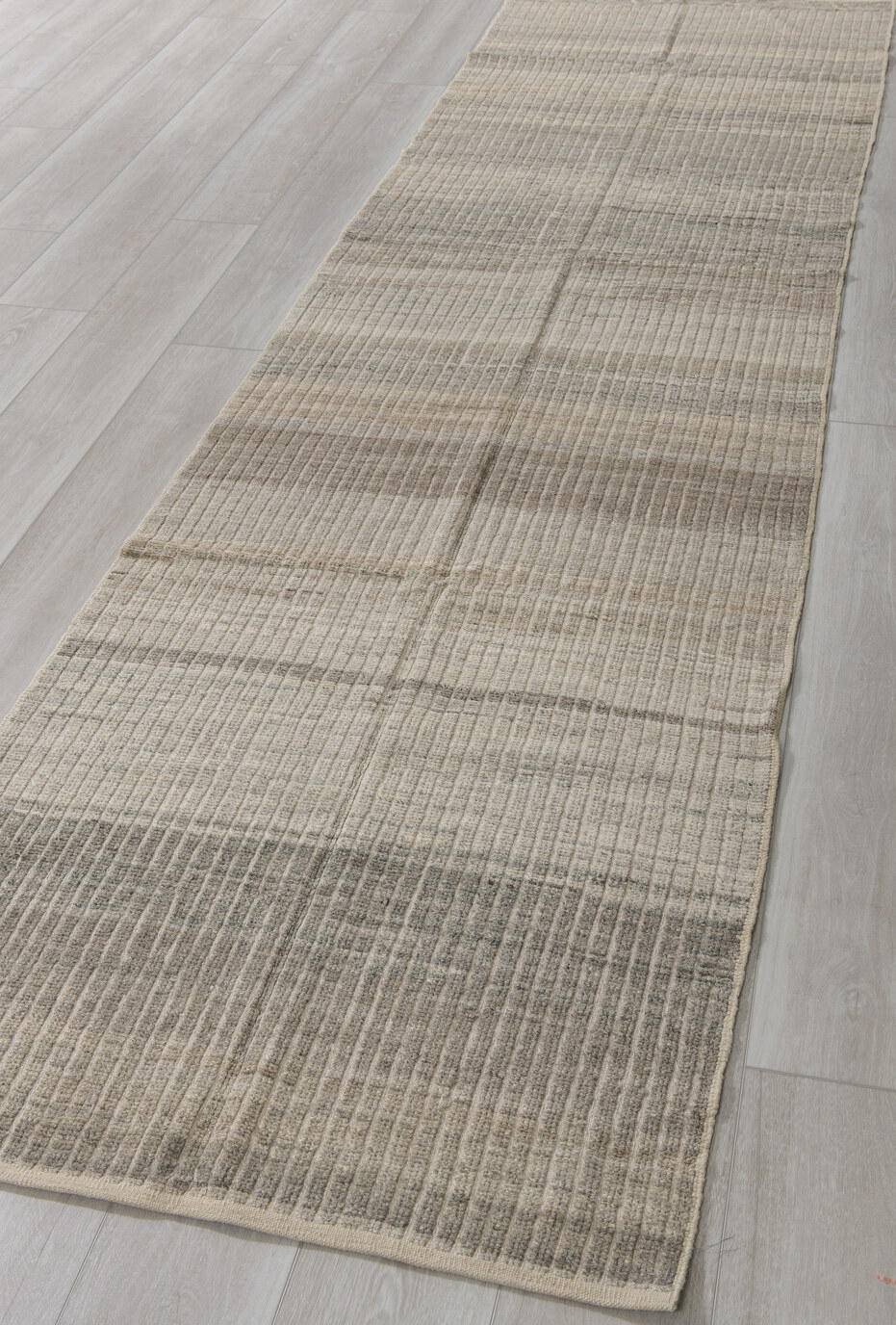 3' x 11' one-of-a-kind handmade vintage Tulu runner rug. Color palette: dark gray, gray, light gray, off-white, silver