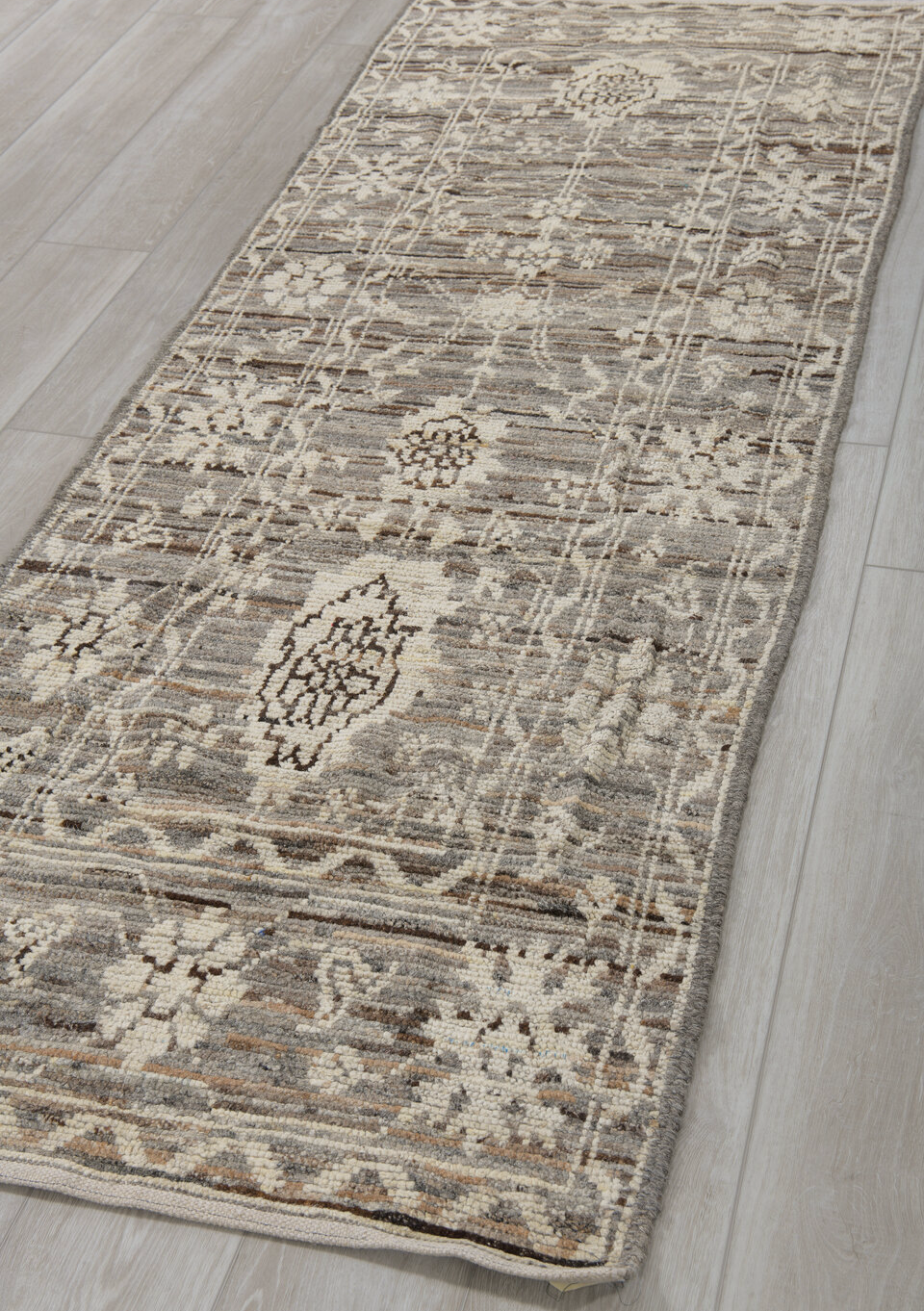 3' x 8' one-of-a-kind handmade vintage Tulu runner rug. Color palette: brown, dark gray, gray, light gray, off-white, silver