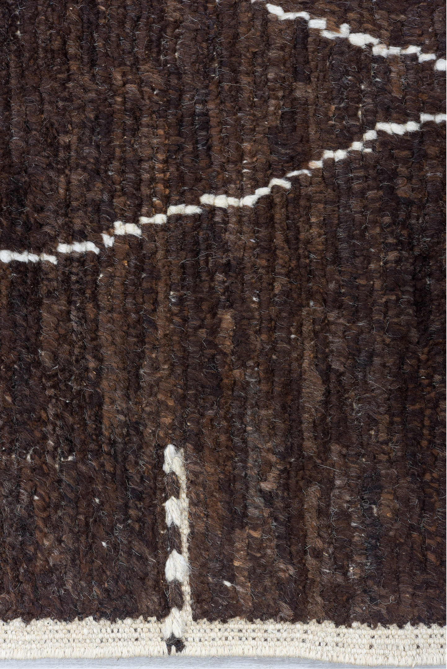 8' x 9' one-of-a-kind handmade vintage Tulu rug. Color palette: black, blue, brown, gray, light gray, off-white