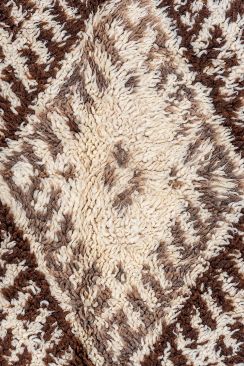 3' x 7' one-of-a-kind handmade vintage Moroccan rug. Color palette: black, brown, gray, light gray, off-white, pink