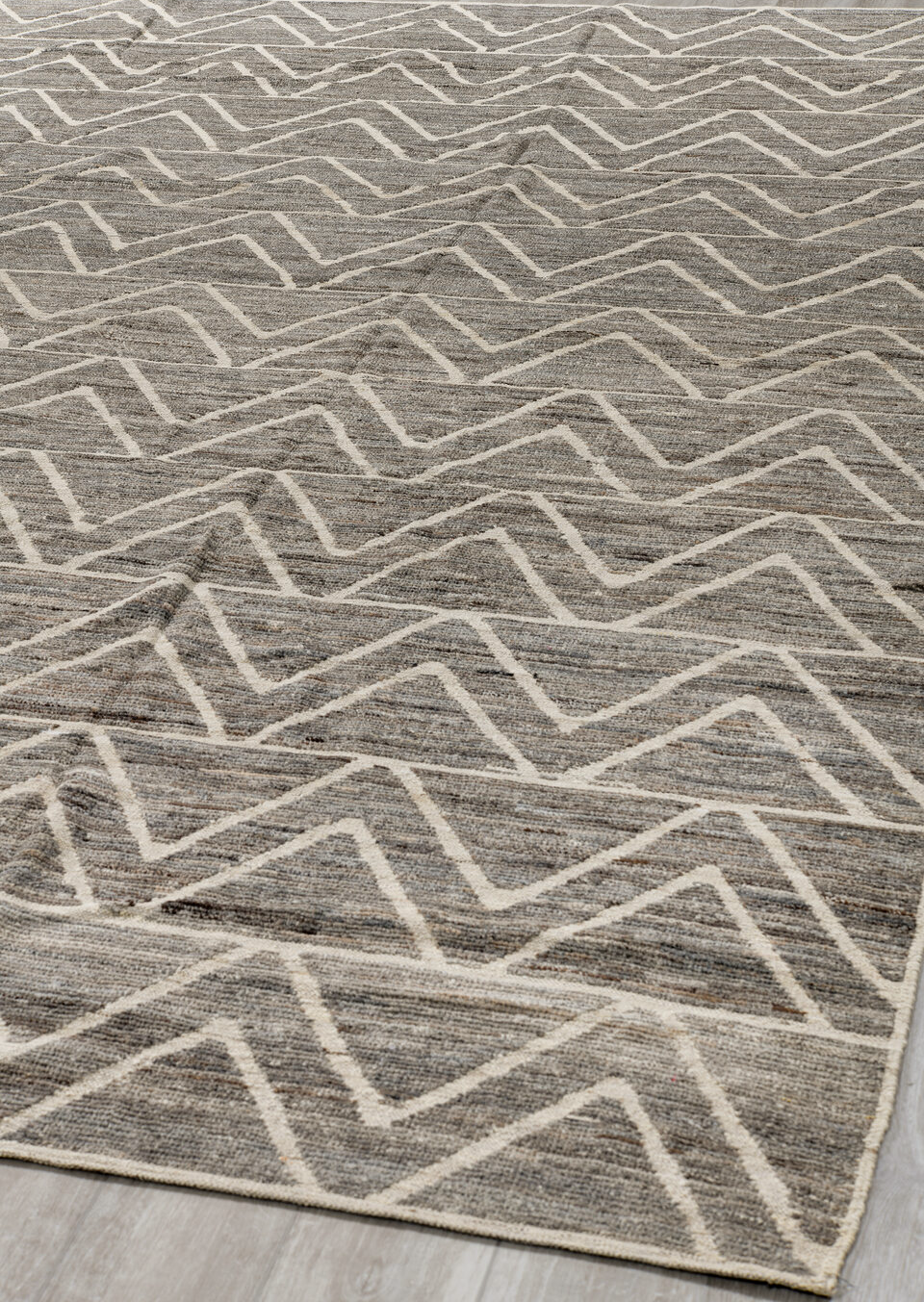 9' x 12' one-of-a-kind handmade vintage Tulu large size rug. Color palette: black, gray, light gray, off-white, silver