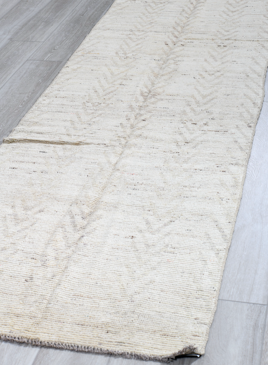 3' x 10' one-of-a-kind handmade vintage Tulu runner rug. Color palette: black, dark gray, gray, light blue, light gray