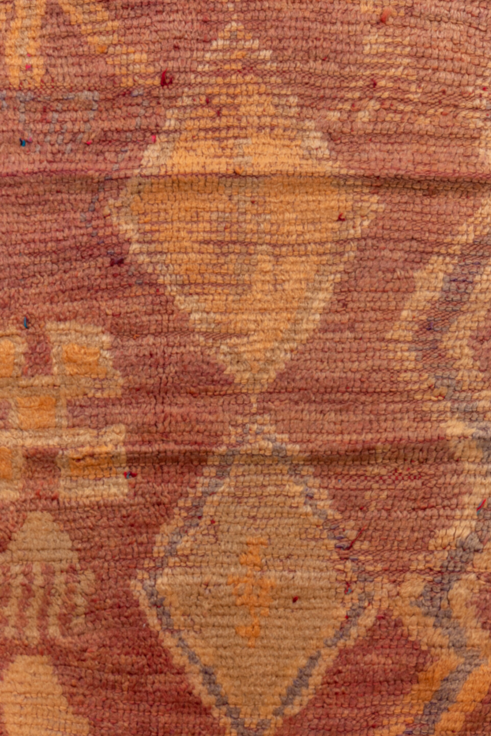 2' x 7' one-of-a-kind handmade vintage Moroccan runner rug. Color palette: brown, orange, pink, red