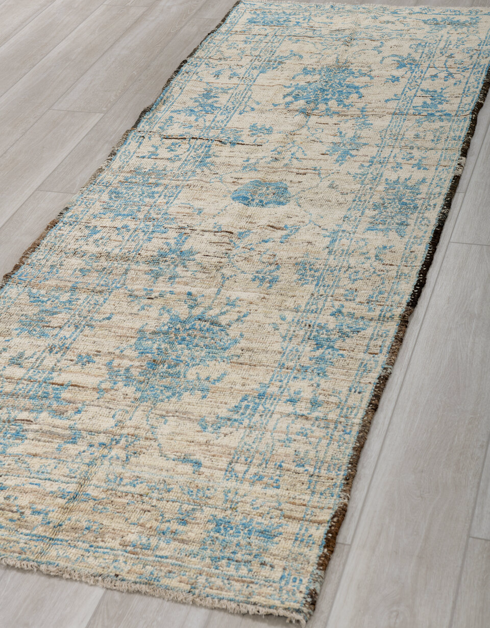 3' x 8' one-of-a-kind handmade vintage Tulu runner rug. Color palette: black, blue, brown, gray, light gray, off-white