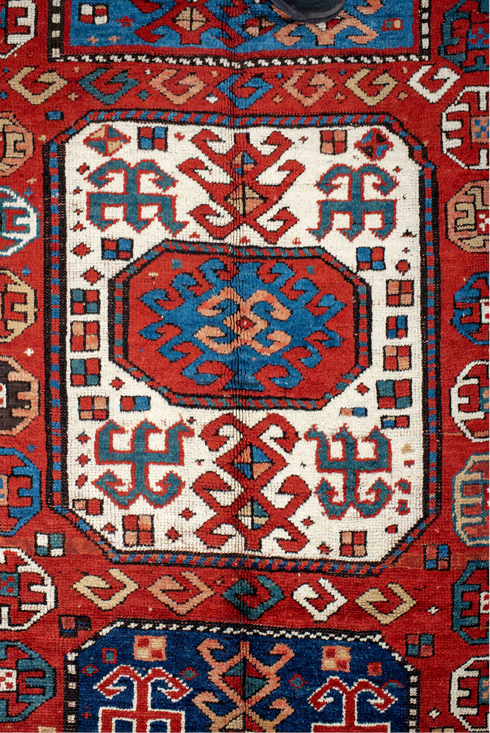 Antique Kazak Area Rug (5' x 10')