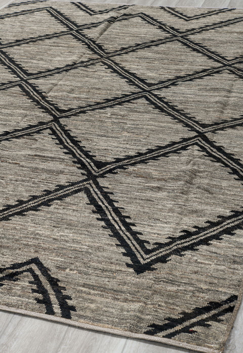 7' x 10' one-of-a-kind handmade vintage Tulu large size rug. Color palette: black, charcoal, dark gray, gray, light gray