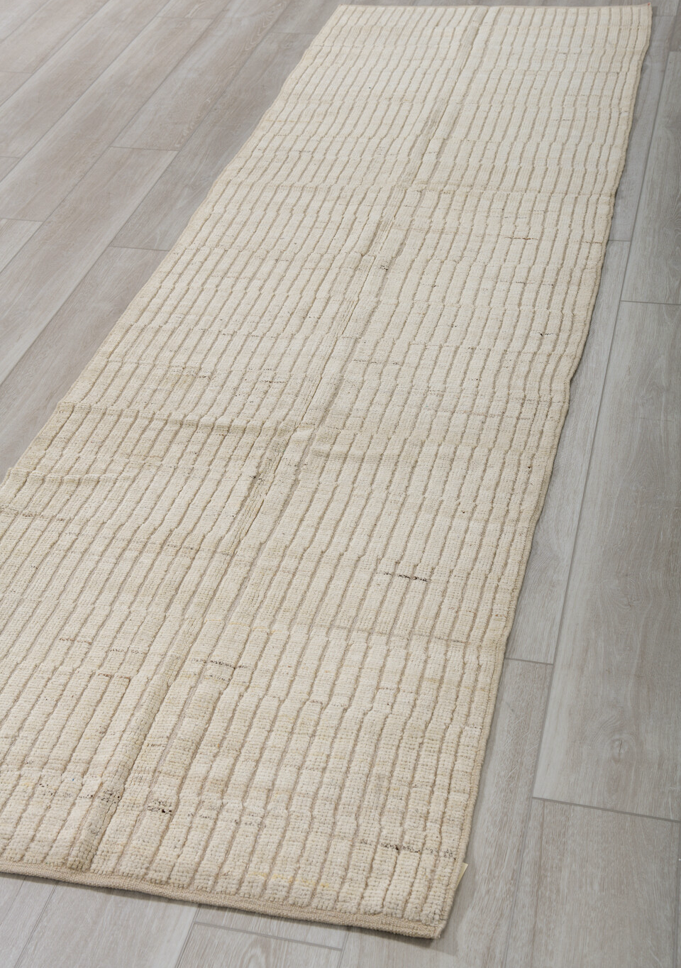 3' x 9' one-of-a-kind handmade vintage Tulu runner rug. Color palette: dark gray, gray, light gray, off-white, silver