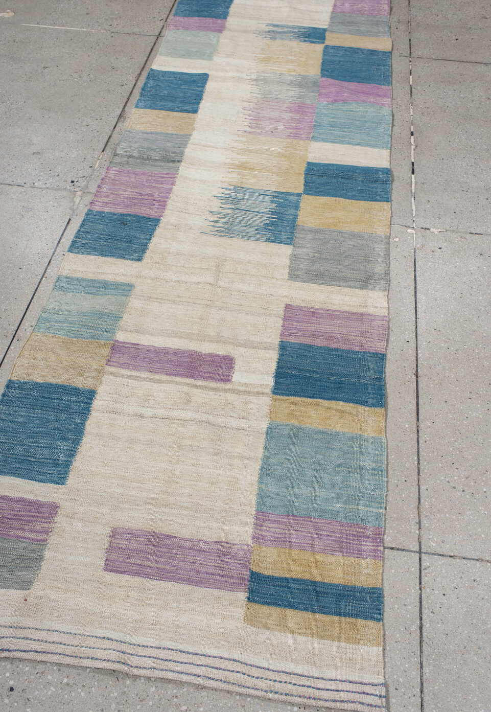 2' x 9' one-of-a-kind handmade vintage Kilim runner rug. Color palette: gray, brown, pink, blue, light gray, off-white
