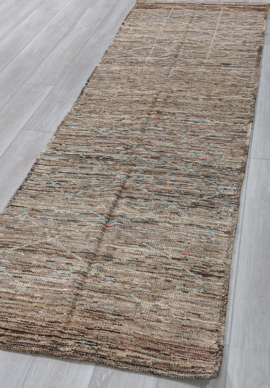 3' x 10' one-of-a-kind handmade vintage Tulu runner rug. Color palette: blue, brown, dim gray, gray, light gray, off-white