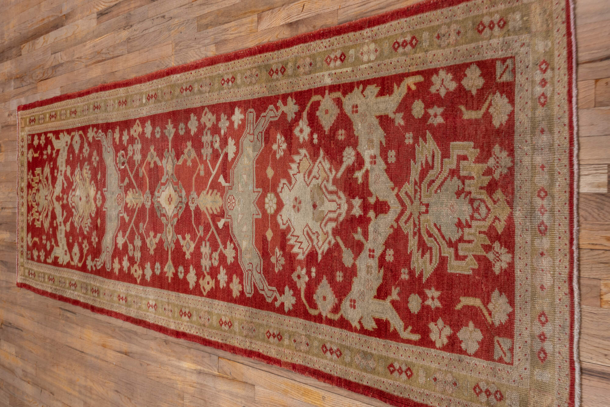 3' x 11' one-of-a-kind handmade vintage Oushak runner rug. Color palette: brown, dark red, maroon, off-white, orange, pink