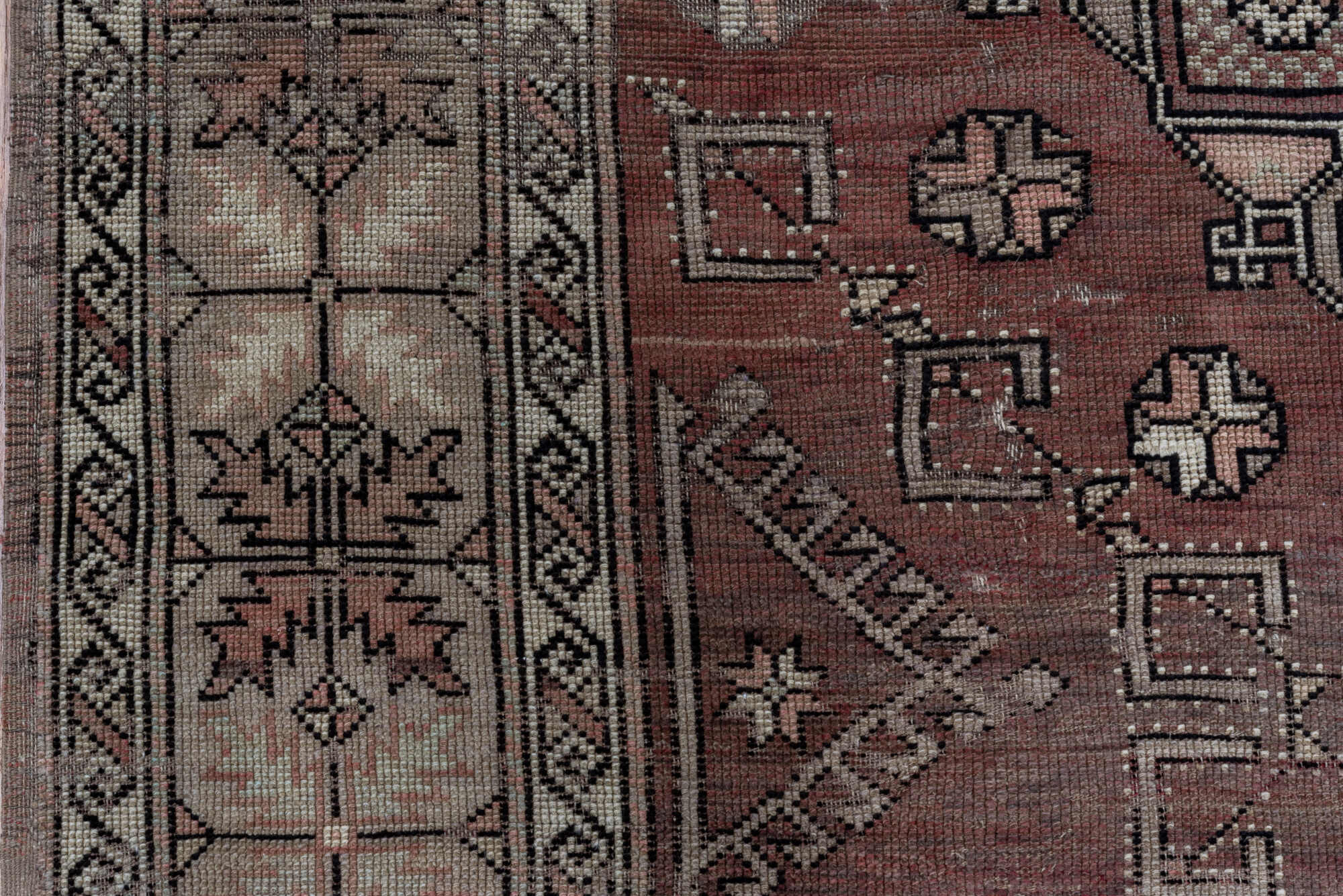 5' x 7' one-of-a-kind handmade vintage Oushak rug. Color palette: black, brown, gray, light gray, pink