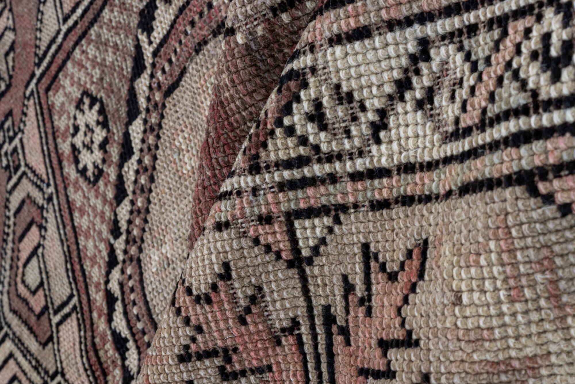 5' x 7' one-of-a-kind handmade vintage Oushak rug. Color palette: black, brown, gray, light gray, pink