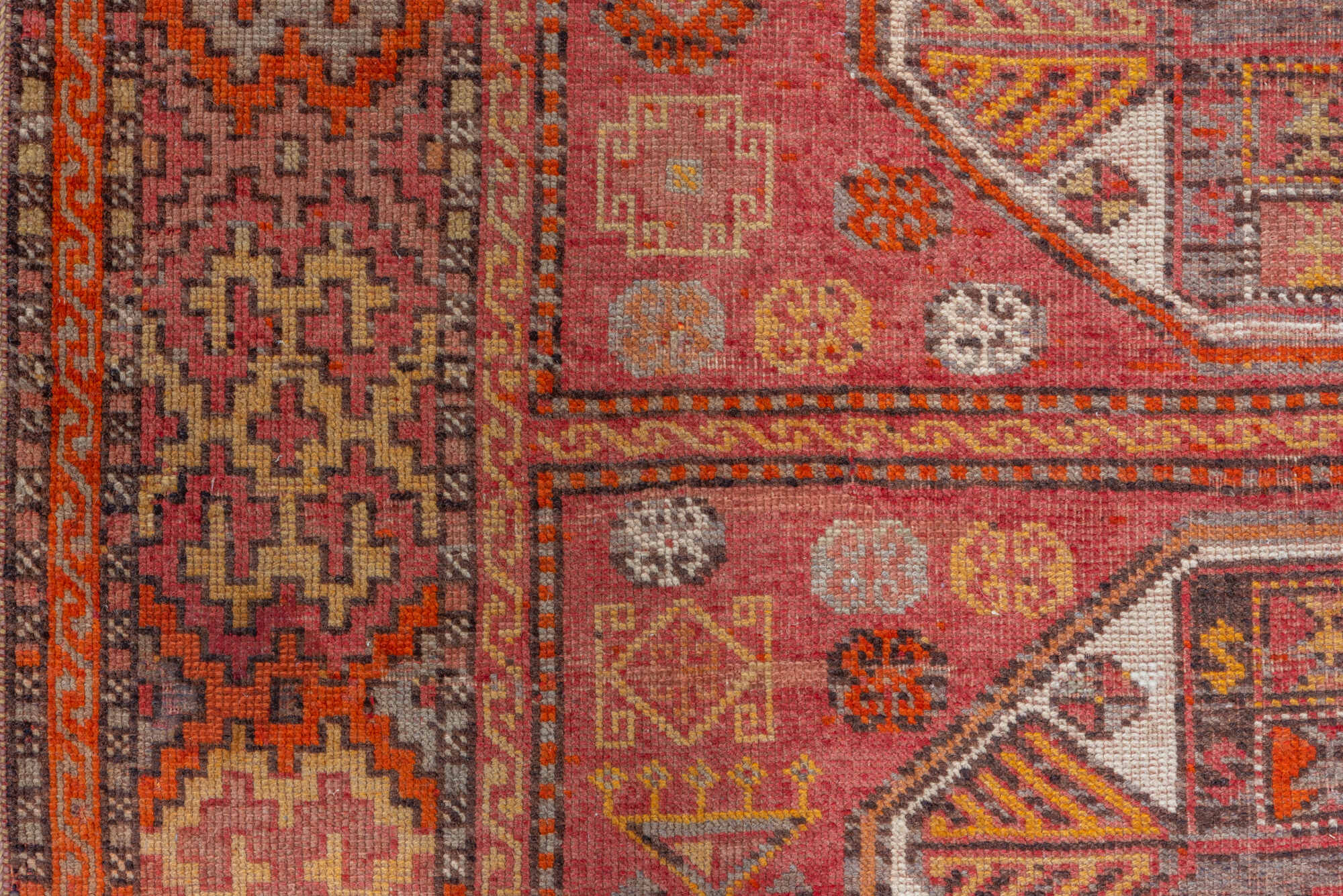 4' x 11' one-of-a-kind handmade vintage Oushak runner rug. Color palette: brown, maroon, pink, red, sienna