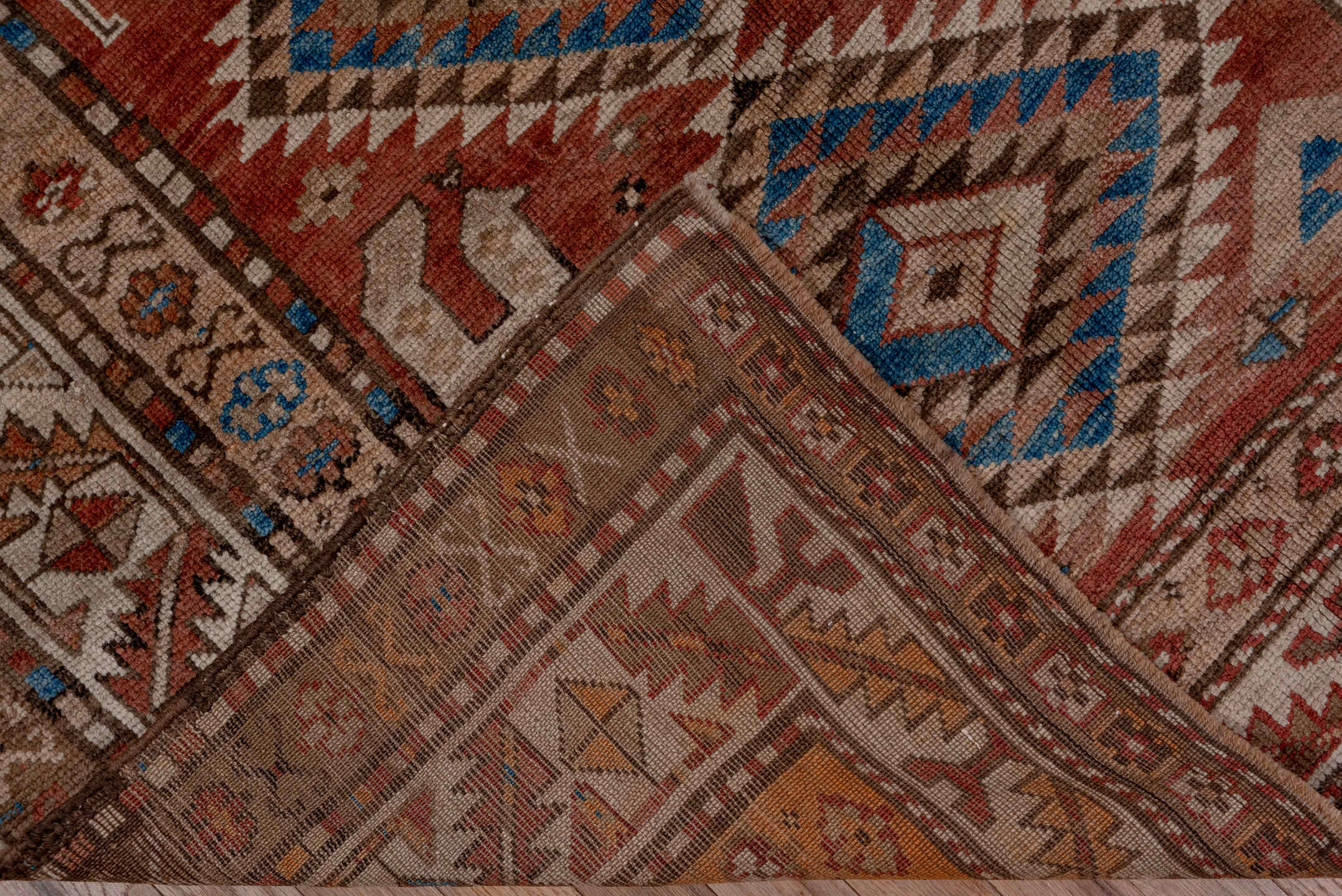 4' x 9' one-of-a-kind handmade vintage Kurd runner rug. Color palette: brown, gray, blue, pink, light gray, arapawa