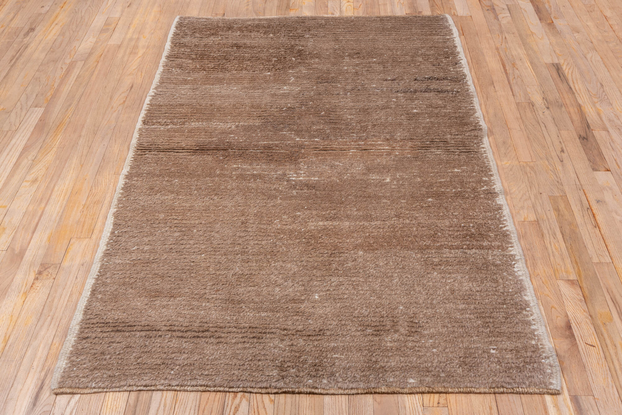 4' x 6' one-of-a-kind handmade vintage Tulu small size rug. Color palette: brown, gray, light gray, off-white, pink, snow