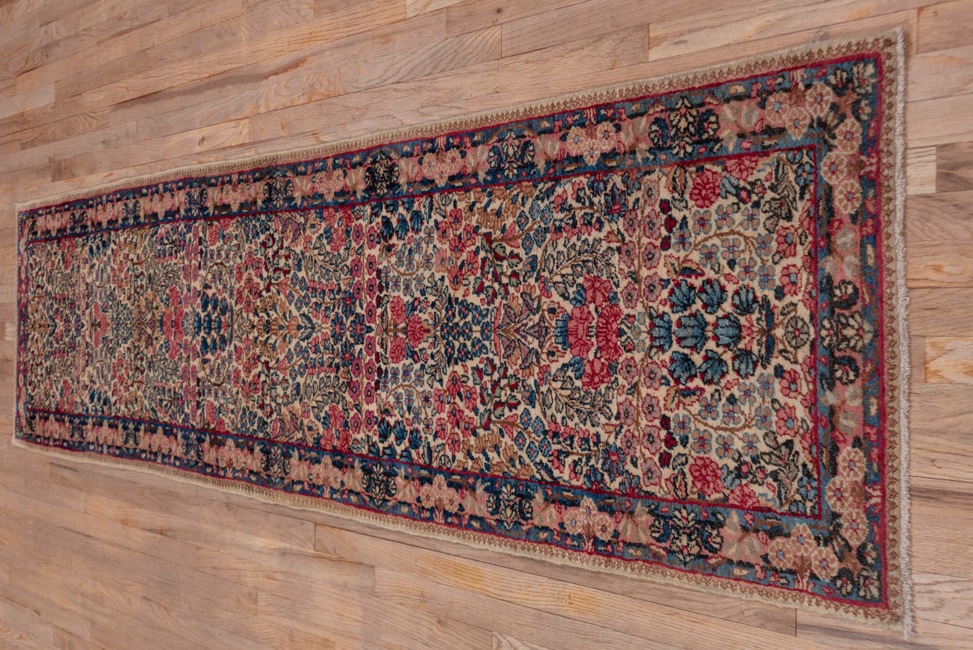 2' x 10' one-of-a-kind handmade vintage Kerman runner rug. Color palette: brown, dim gray, gray, pink, red