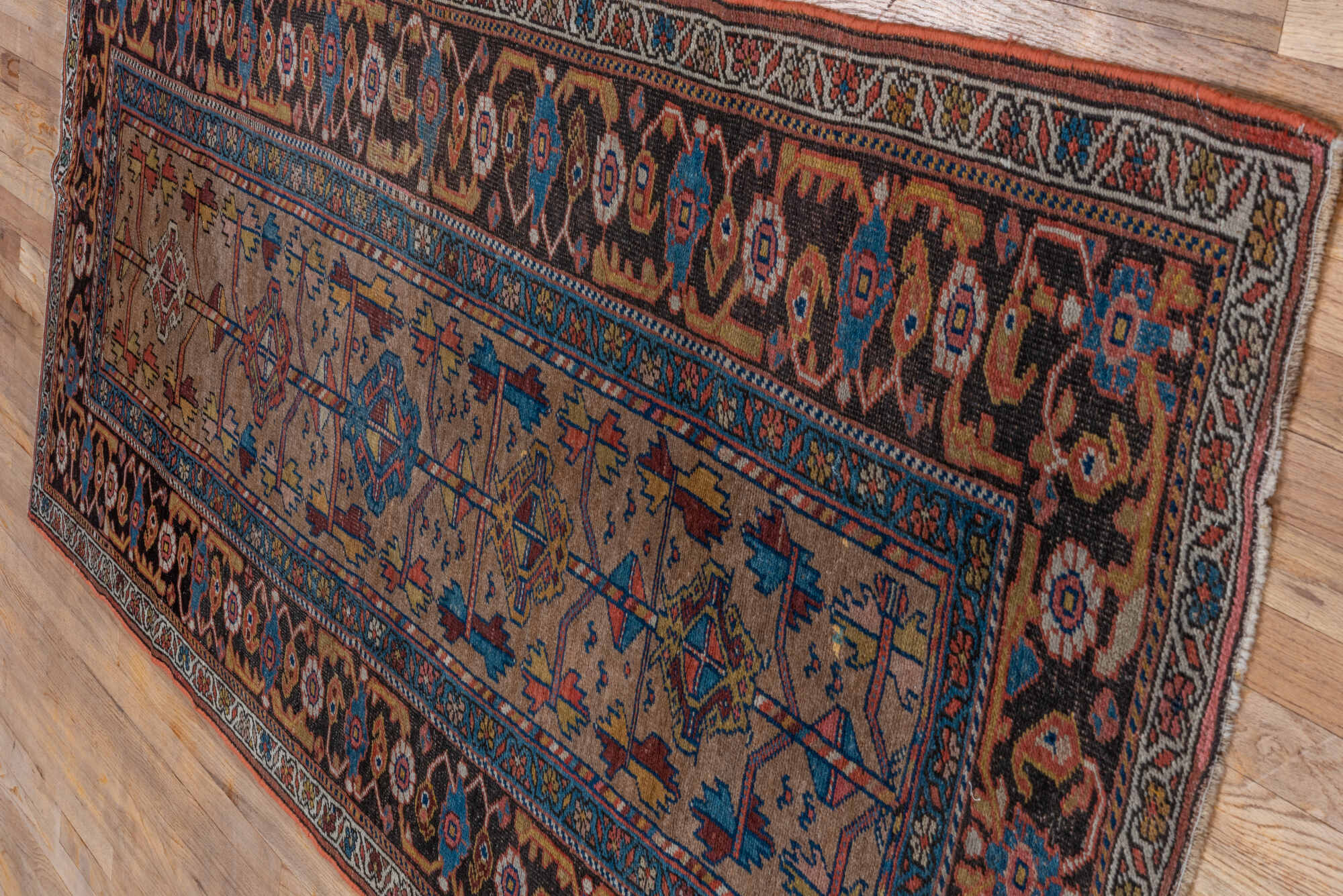 3' x 8' one-of-a-kind handmade vintage Kurd runner rug. Color palette: arapawa, blue, brown, gray, pink, red, redwood