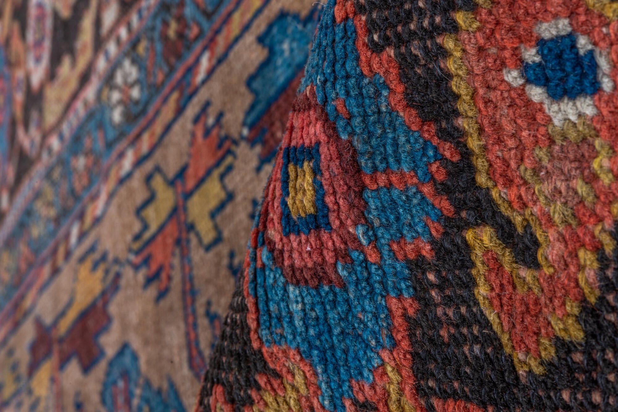 3' x 8' one-of-a-kind handmade vintage Kurd runner rug. Color palette: arapawa, blue, brown, gray, pink, red, redwood