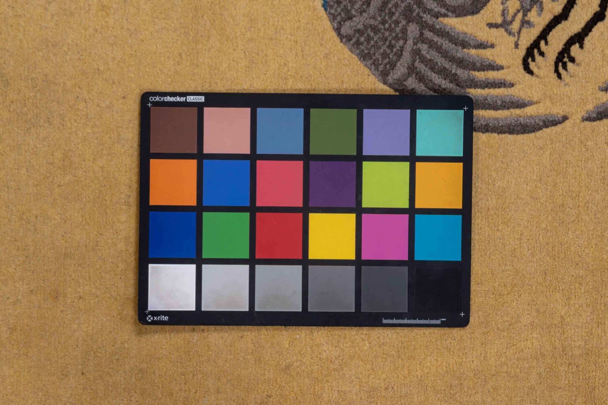 4' x 9' one-of-a-kind handmade vintage Chinese runner rug. Color palette: black, brown, gray, off-white, snow, white