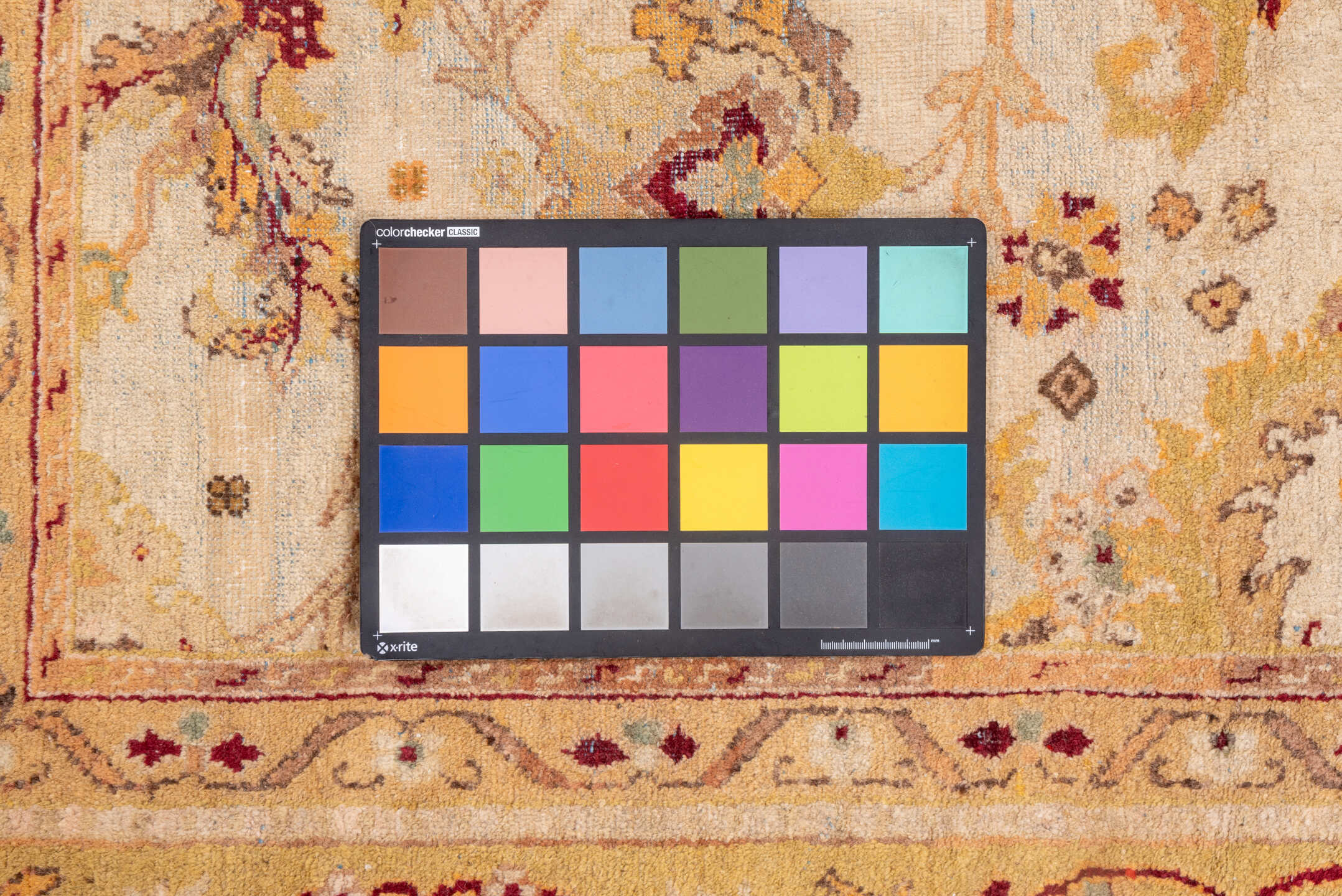 9' x 11' one-of-a-kind handmade vintage Amritzar large size rug. Color palette: brown, pink, orange, yellow, off-white, red