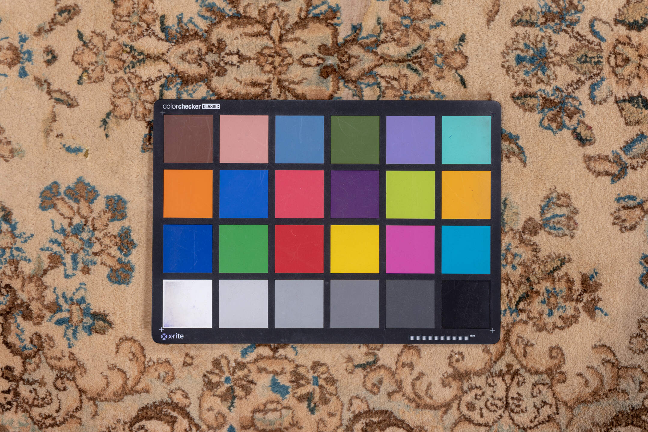 2' x 20' one-of-a-kind handmade vintage Kerman runner rug. Color palette: brown, gray, red, light gray, off-white, pink