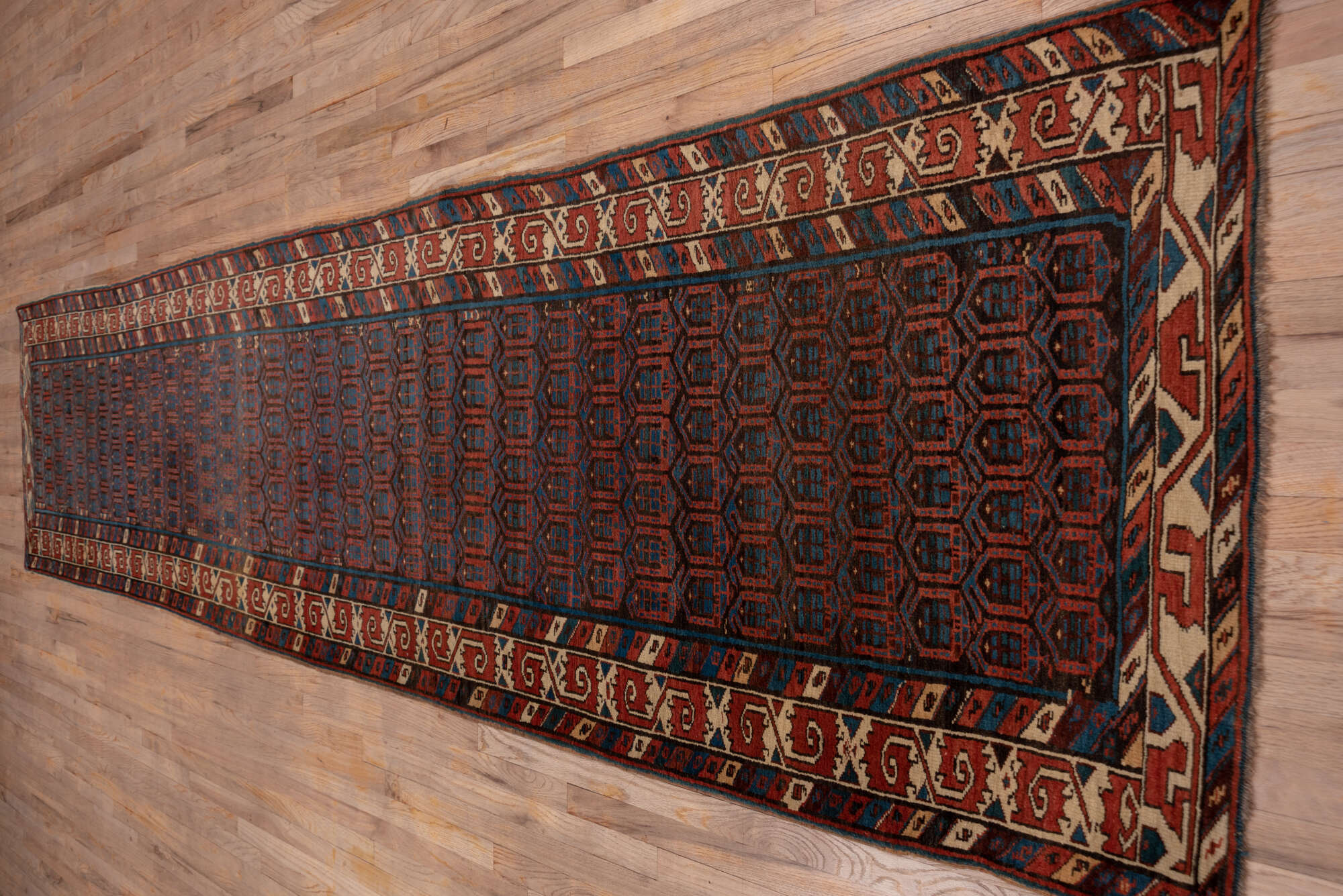 3' x 15' one-of-a-kind handmade vintage Sarab runner rug. Color palette: black, blue, brown, charcoal, gray, off-white, red