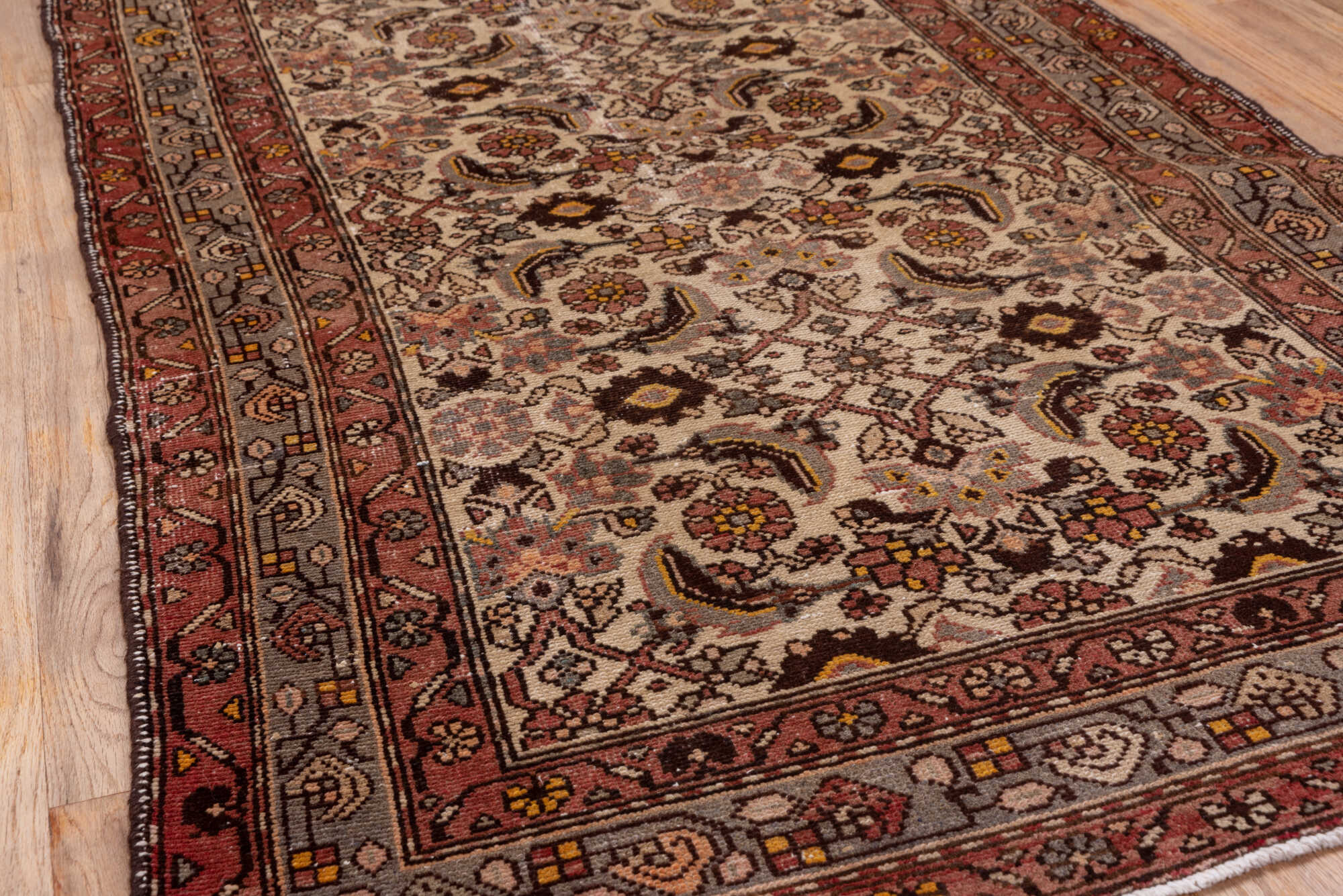 3' x 10' one-of-a-kind handmade vintage Malayer runner rug. Color palette: brown, gray, pink, redwood