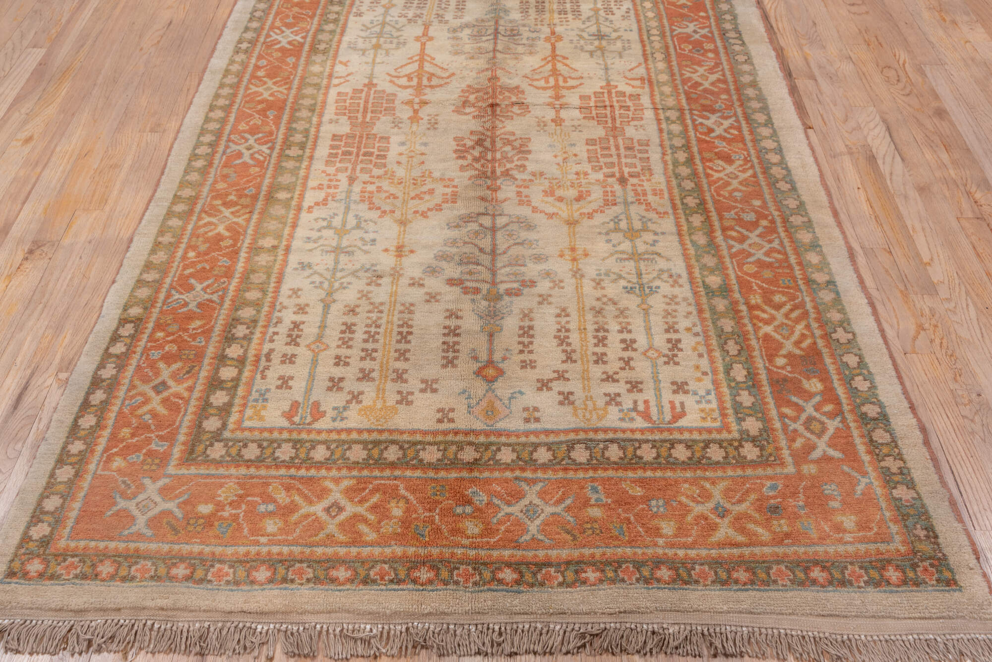 4' x 9' one-of-a-kind handmade vintage Sultanabad rug. Color palette: brown, gray, light gray, off-white, orange, pink